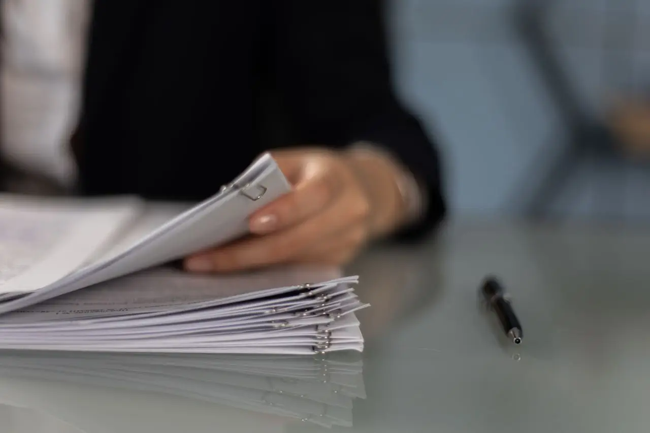 Paperwork and a calculator on a desk